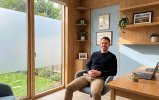 Confident man in modern medical office considering natural methods to increase girth size at home