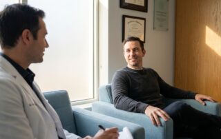 Confident male patient during medical consultation about average penile length in US clinical data