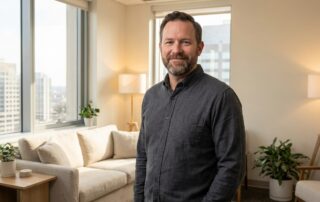 Confident man in a modern medical consultation office representing evidence-based male enhancement options in 2026
